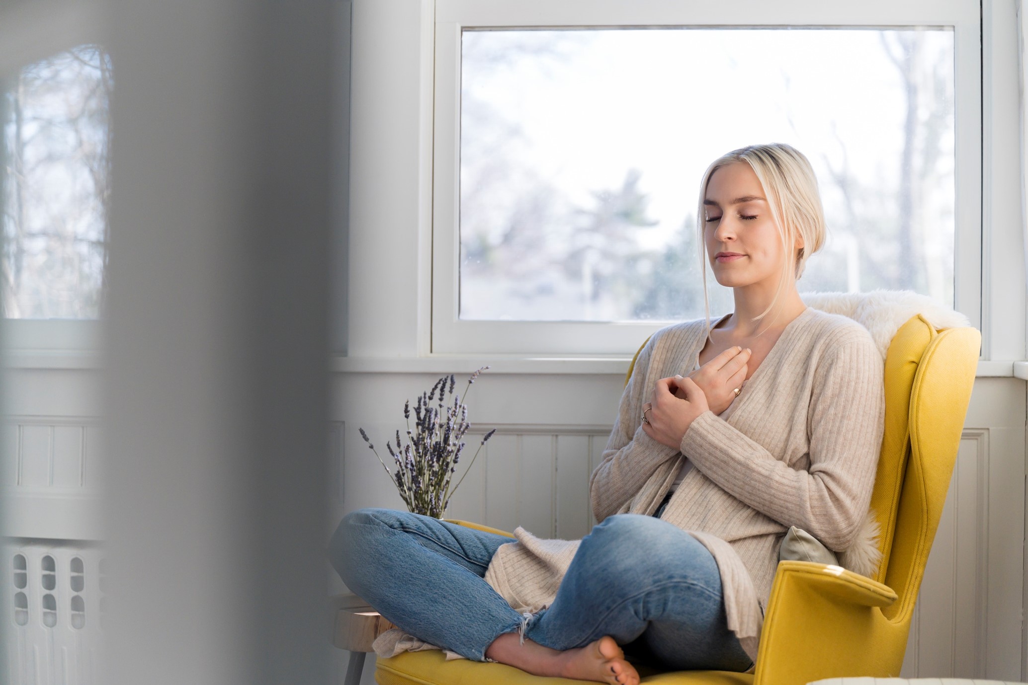 woman sitting on chair in stillness and calm